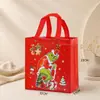 Bolsas de regalo de Navidad de fábrica de venta caliente transfronterizas en stock bolsas de regalo de Navidad no tejidas bolsas de regalo de Navidad impermeables