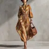 Coleção outono 2026 europeia e americana transfronteiriça: vestido maxi estampado em sarja, com mangas bufantes e saia ampla, cintura marcada, perfeito para férias em um resort