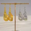Brincos de gancho em U irregulares exagerados em estilo europeu e americano, brincos de metal de moda personalizados transfronteiriços, brincos de nicho de alta qualidade e resistentes
