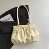 Bolso de mano fresco y delicado de lunares con un lazo, nuevo diseño de moda nicho para mujer 2026, bolso de hombro para ir al trabajo, bolso de axila