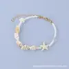 Pulseira Artesanal Tecida à Mão com Conchas e Estrelas do Mar, Estilo Boho Transfronteiriço, Pulseira Fresca e Simples, Joia de Mão Criativa e Doce