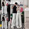 Calça jeans multi-bolsos estilo workwear do Sudeste Asiático transfronteiriça para homens, nova calça de cintura alta afunilada de caimento solto e fluido até o chão para homens