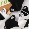 Calcetines de barco para mujer Verano calcetines de algodón bordado en el talón vaca manchas de dibujos animados en blanco y negro calcetines bajos fabricantes al por mayor