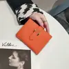 Cartera de Cuero Genuino para Mujer Porta Tarjetas Ultraligera con Cierre Estilo Corto Elegante Combinación Diaria Versátil Nuevo Producto Caliente Transfronterizo 2025
