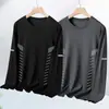 Camiseta informal de manga larga con cuello redondo, color liso, versátil, para hombre, otoño 2026, corte holgado, top moderno