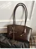 Bolsa para Comutador Transfronteiriço Feminina 2025 Nova Popular Moda Versátil Bolsa de Ombro Textura Casual Versátil Bolsa Tote
