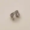 Pendientes de clip de oreja de circonita microincrustada escalonada de estilo frío, elegantes y con personalidad de Corea del Sur, sencillos y a la moda que combinan con todo.