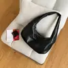 Bolso de Moda Nuevo de un Solo Hombro para Mujer Estilo Coreano Nicho Versátil Bolso de Mano para Viajes Cotidianos Cuero PU Suave Simple Bolso de Hombro tipo Dumpling para Mujer