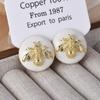 Moda Europea y Americana Lujo Accesible Aretes de Abeja Retro de Alta Gama con Goteo de Aceite Nicho Aretes Estilo Antiguo Aretes Redondos Negros