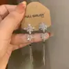 Pendientes Largos con Borla de Copo de Nieve de Circonita Micro-Pavimentada para Mujer, Lujo Ligero, Pendientes de Gama Alta, Exquisitos Pendientes Largos de Nicho al por Mayor