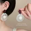 Pendientes de borla y perla de lujo ligero estilo francés para mujer, diseño de nicho, sensación de alta gama, versátiles para el uso diario, pendientes de botón, venta al por mayor