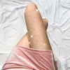 Venta al por mayor de medias de rejilla sexys y seductoras de tallas grandes con varios diseños, incluyendo medias de rejilla estampadas y medias transparentes