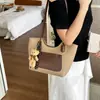 Bolso de hombro cruzado europeo y americano con bloques de color, gran capacidad, nuevo de moda 2026, versátil, elegante, simple, de alta apariencia, tote