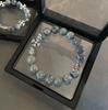 Pulsera original con cruz de piedra y flores para hombre y mujer, combinable con todo, diseño de nicho, joyería urbana de hip hop de alto nivel para parejas.