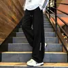 Marca de moda americana Pantalones de chándal grises de peso pesado con corte oblicuo para hombre y mujer Otoño Holgados Adelgazantes High Street Pierna recta Deportivos Casuales Pantalones largos