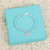 Nova Pulseira Clássica de Contas de Amor para Mulheres Banhada a Prata Esmalte Coração de Pêssego Vermelho Azul Rosa Três Cores Corrente de Contas de Buda para Mulheres Atacado