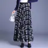 Falda estampada reversible para mujer, nueva falda de cuadros vintage línea A otoño/invierno 2026, cintura alta adelgazante con bajo amplio, moderna
