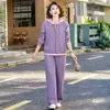 Nuevo conjunto deportivo casual de alta gama estilo mamá para otoño 2026, con un diseño de dos piezas con un top de manga larga