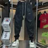 Pantalones Harem Negros de Moda Versátiles con Cintura de Cordón 2026 Nuevos Pantalones Deportivos Casuales de Secado Rápido para Hombre Simples y Transpirables