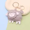 Llavero de Oveja Linda Muñeco de Dibujos Animados Colgante de Cuero Zodiaco Tridimensional Año de la Oveja Llavero de Bolso Colgante para Coche