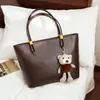 Bolso de mano retro transfronterizo de gran capacidad, simple, color sólido, textura de alta calidad, para ir al trabajo, bolso de un solo hombro, cuero suave, estilo coreano, bolso de mano