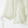 Estilo europeu e americano, nova coleção de outono de roupas femininas: camisas da moda e versáteis de corte solto com gola mandarim e bordados de renda