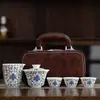 Tendencia Nacional Cerámica Dehua Estilo Chino Tazón con Tapa de Loto Similar al Jade Juego de Té Kung Fu Caja de Regalo de Cuero de Gama Alta Personalizable