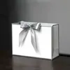 Bolsas de Papel con Moño de Regalo en Stock para Comercio Exterior y Compras Transfronterizas, Personalizables con Impresión de Logo, Envío Gratis