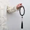 Pulsera de mano de obsidiana sintética piedra negra giro a mano estilo antiguo enrollado mango suave jugando librojoven Mismo estilo Tai Cui de mano