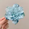 Atmósfera de Primavera Estilo Resort Costero Accesorios de Pasador de Flor de Orquídea Mariposa Simulada 2025 Nueva Diadema para Mujer