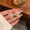 Brincos de flor de cristal de luxo leve coreanos para mulheres, tarrachas de pérola versáteis de nicho de alta qualidade, novos brincos da moda atacado