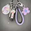 Llavero de Flor Colorida Dopamina Colgante de Corazón Girly para Bolso Accesorio Set de Llavero Cortaúñas y Limpiador de Oídos