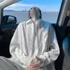 Camisa de manga larga de alta gama con estampado de mármol para hombre 2026, holgada, casual, fluida, versátil, ligera