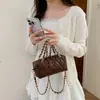 Bolso de mujer estilo Chanel 2026 nuevo modelo, bolso de mano acolchado con cadena súper popular, bolso tipo almohada con sensación de alta gama, bolso de hombro y cruzado