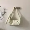 Bolsa de mão casual moderna e única para mulheres, nova coleção 2026, bolsa de ombro de estilo descontraído, bolsa da moda e popular em formato de bolinho