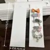 Corda de Cabelo Placa de Cabelo 10 Etiquetas Crianças Acessórios de Cabelo de Papelão Pegador Estendido 0 Venda Direta de Fábrica Cartão Veja Descrição Outros