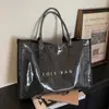 Bolsa de Mão Casual Feminina Estilosa e Relaxada, Estilo Novo para o Início da Primavera de 2026, Tote Bag Grande, Tendência, Simples e Personalizada