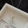 Collar de Borlas Plateadas Estilo Mismo de Bloguera Coreana para Mujer 2025 Nueva Cadena Larga para Clavícula Diseño de Nicho Accesorios para Sudaderas