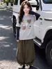 Conjunto de Ropa de Otoño para Niñas 2026 Nuevo Estilo Top de Dos Piezas Falso para Niños Ropa Moderna de Primavera y Otoño para Niñas Mayores