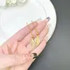 Nuevos Pendientes de Oro Arena de Vietnam Estilo Étnico Vintage Hojas Huecas Borla Gancho para la Oreja Joyería Vintage de Larga Duración Sin Decoloración para Mujer