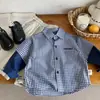 Camisa para Niños Bangcheng 2026 Otoño Nueva Estilo Coreano Parches Infantiles Falso Dos Piezas Cuadros Moderna Venta al por Mayor