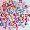 Polvo de oro versión coreana de accesorios de resina de amor de cinco estrellas para niños anillo de niña de bebé horquilla accesorios para cuerda de pelo venta al por mayor