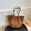 Bolso tote retro versátil de moda transfronterizo para uso diario para mujer, bolso de hombro para commuting, bolso de mano grande de estilo coreano