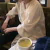 Camisa de mujer coreana Dongdaemun de alta gama para otoño, nueva, de rayas verticales, con volantes, dulce y elegante