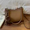 Comercio Electrónico Transfronterizo Más Vendido Nicho Retro Bolso de Axila Nuevo para Mujer Gran Capacidad Versátil para el Trabajo Bolso de Hombro Cruzado