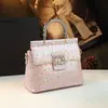 Bolso de Concha Diseño de Nicho para Mujer Modelo Nuevo 2025 Lujo Ligero Elegante Bolso de Mano con Patrón de Avestruz Hombro Único Cruzado Cuero Genuino
