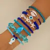 Conjunto de pulseiras de férias estilo boêmio transfronteiriço europeu e americano, pulseira multicamadas com sementes, concha e estrela-do-mar