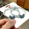 Lazo para el cabello de celebridad de Internet Cuerda para el cabello Lindo Mori Banda para el cabello Pequeño Fresco Simple Lazo Banda de goma Dibujos animados Versátil Estilo coreano Estuche de cuero