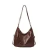 Bolsa Tote de Gran Capacidad Transfronteriza para Mujer 2026 Primavera Nuevo Estilo Coreano Retro Casual Bolso de Hombro Mochila Simple de Moda