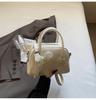 Bolso de mujer de primavera 2025, diseño de nicho de moda, informal, sencillo, pequeño, cuadrado, bolso de mano, bandolera de hombro.